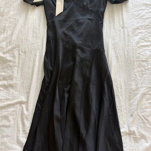Bohme Black Midi Dress with velvet bow sleeves